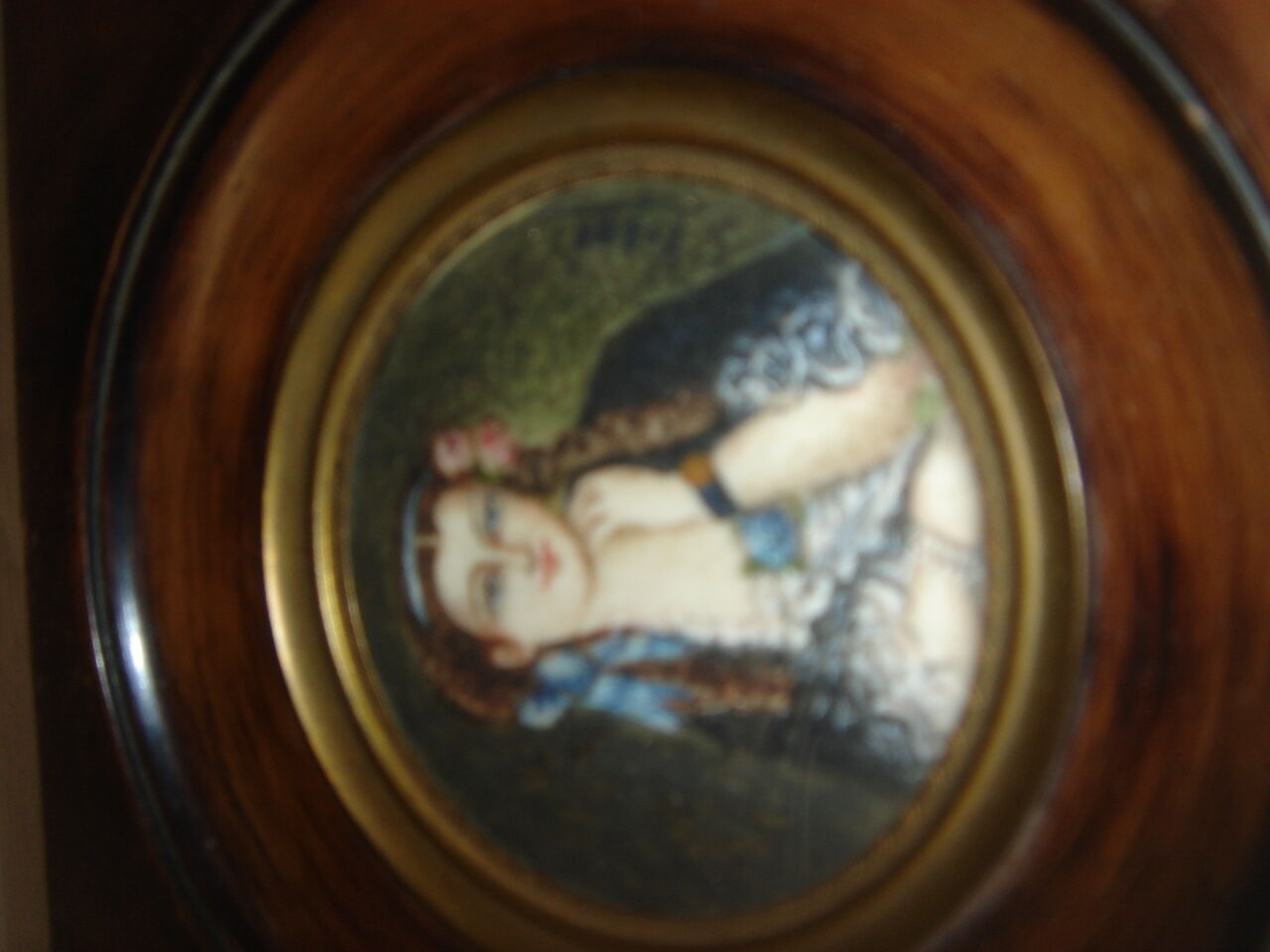 Miniature portrait of woman signed Vigué