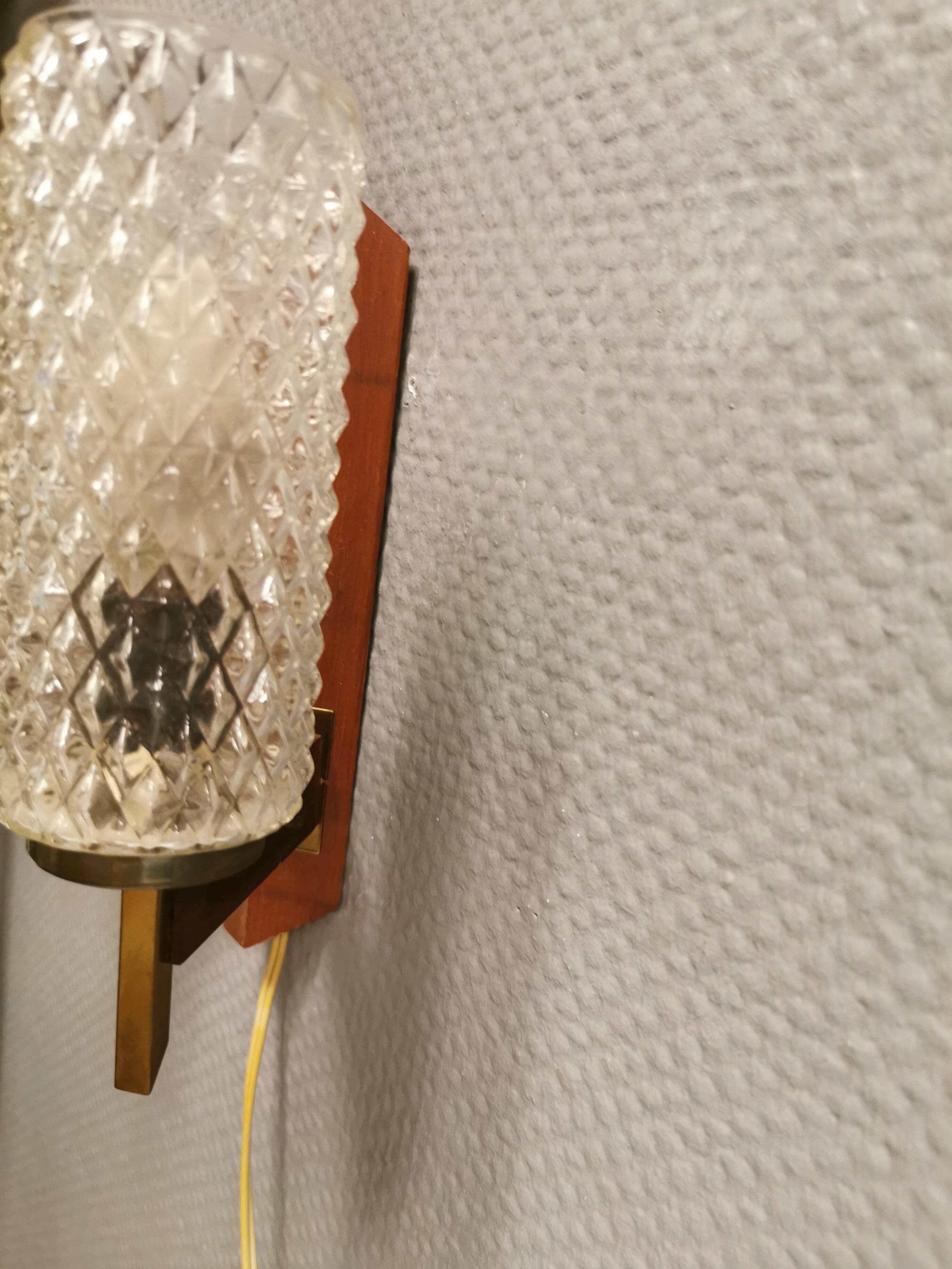 Danish double wall light in teak, brass and crystal glass.