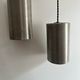 Pair of vintage brushed metal pendant lamps, France 1960