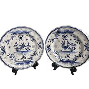 Moustiers, pairs of plates with wading bird design, scalloped edge, early 20th century.