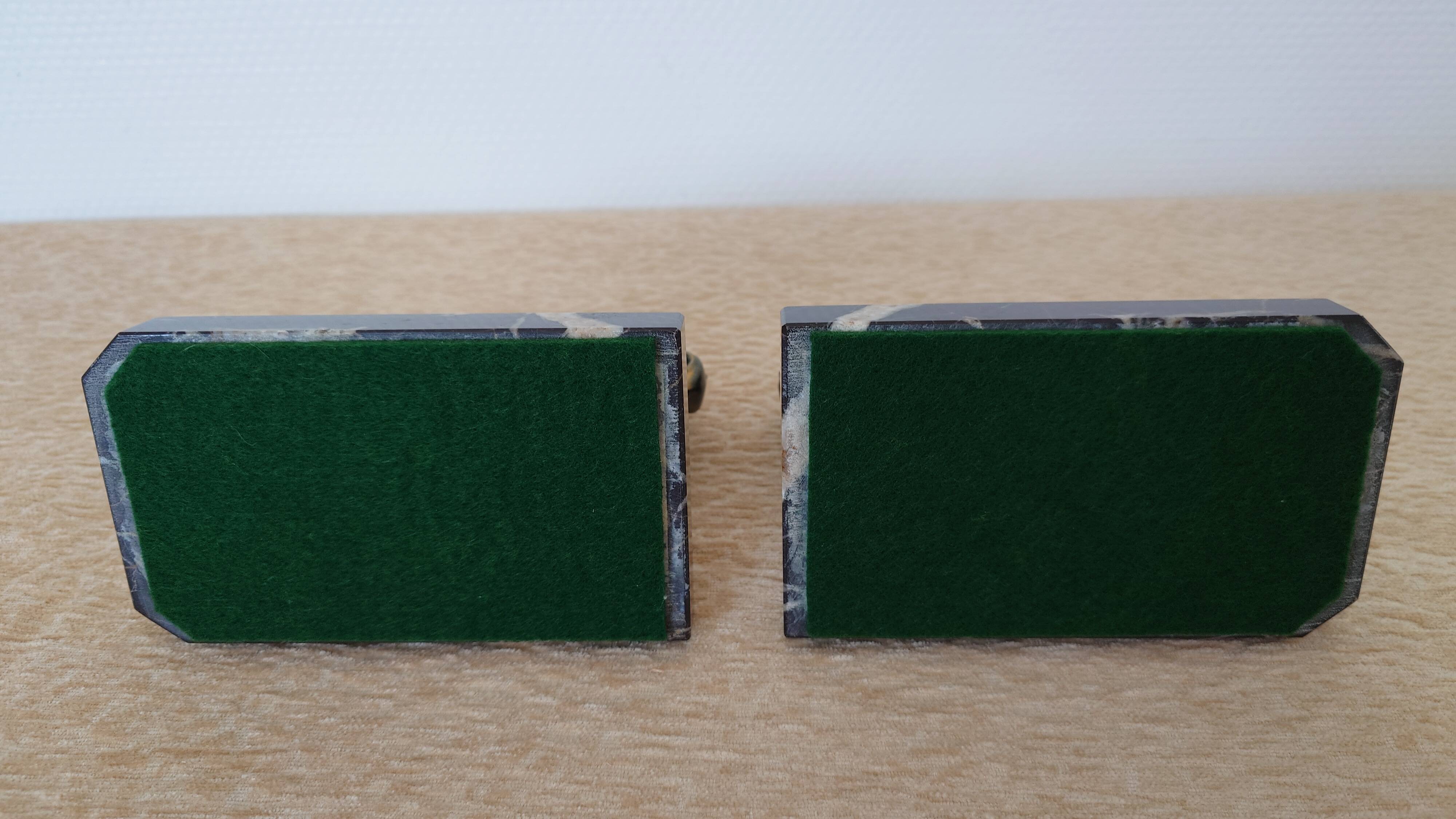 Bookends in the style of stylised donkeys, patinated metal and marble - circa 1940-1950.