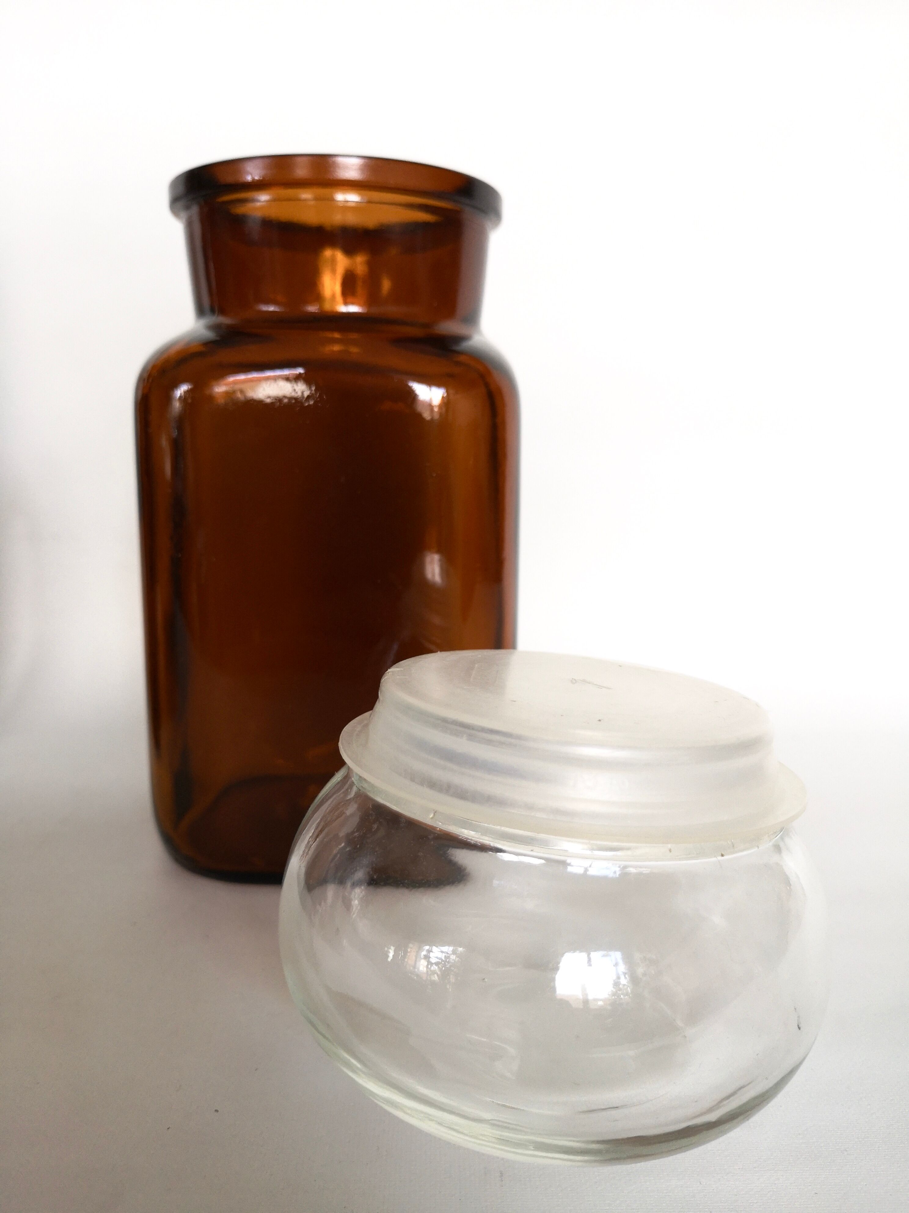 Set of 4 clear and brown glass jars