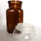 Set of 4 clear and brown glass jars