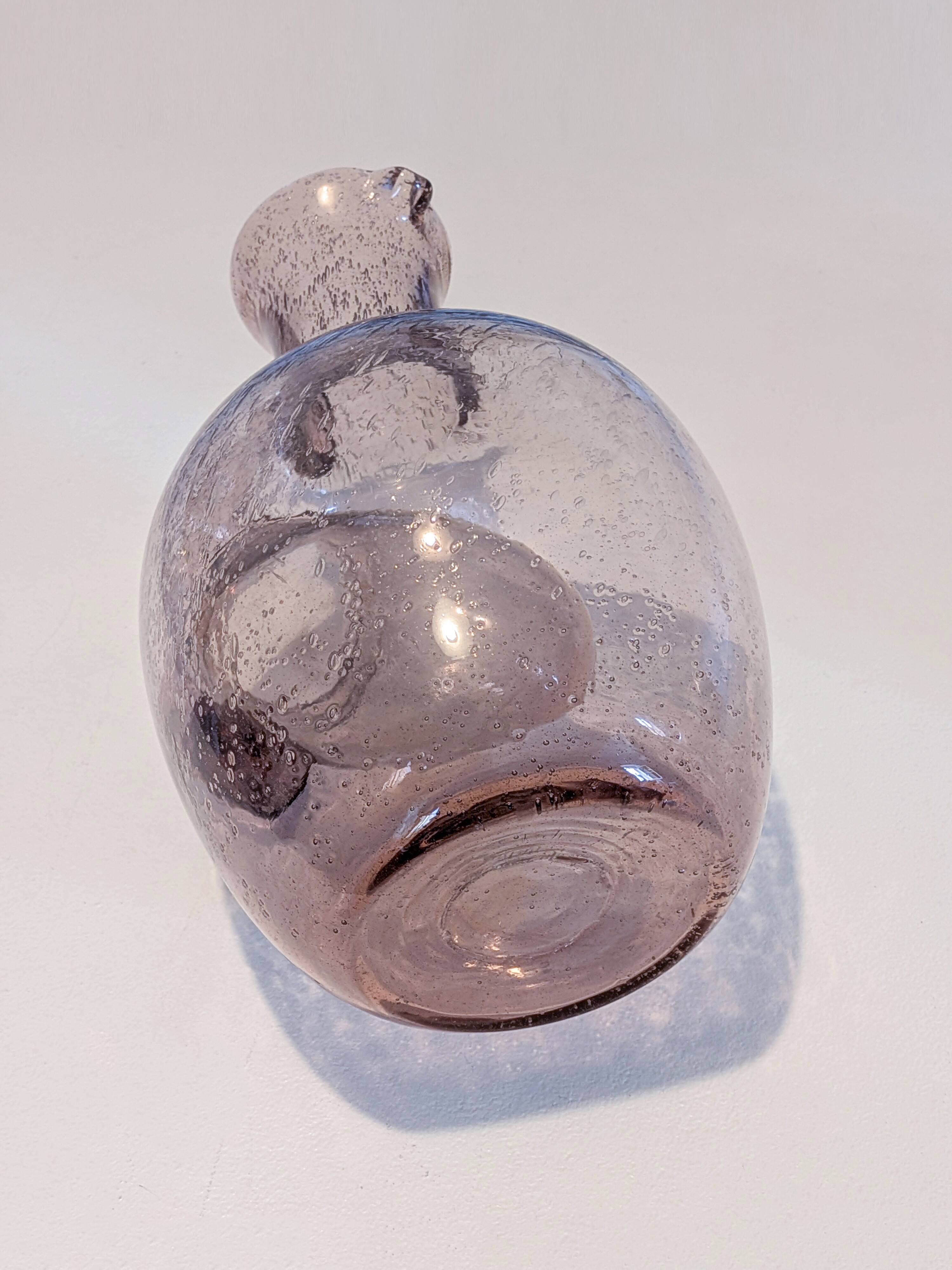 Large ice pitcher from Verrerie de Biot in amethyst bubble glass.