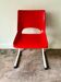 Children's chair in white metal and red plastic