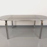 Vintage oval dining table in smoked glass and chrome metal, Space Age style.