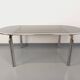 Vintage oval dining table in smoked glass and chrome metal, Space Age style.
