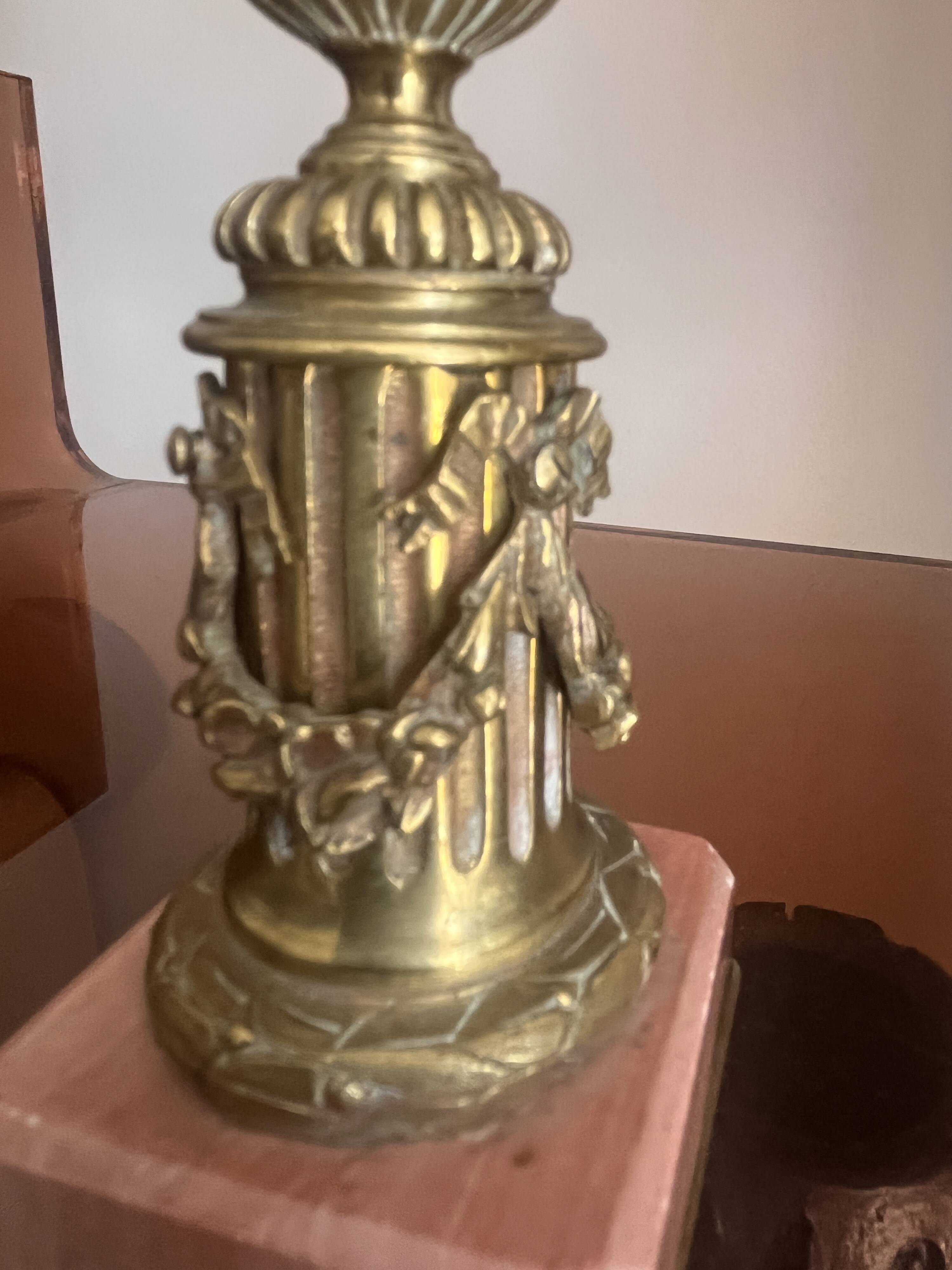 pair of antique bronze candlesticks