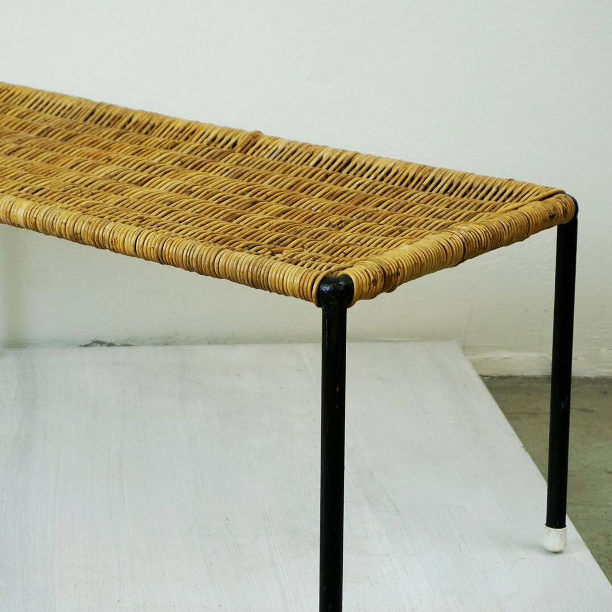 Black steel and wicker side table by Carl Auböck, mid-century.