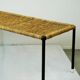 Black steel and wicker side table by Carl Auböck, mid-century.