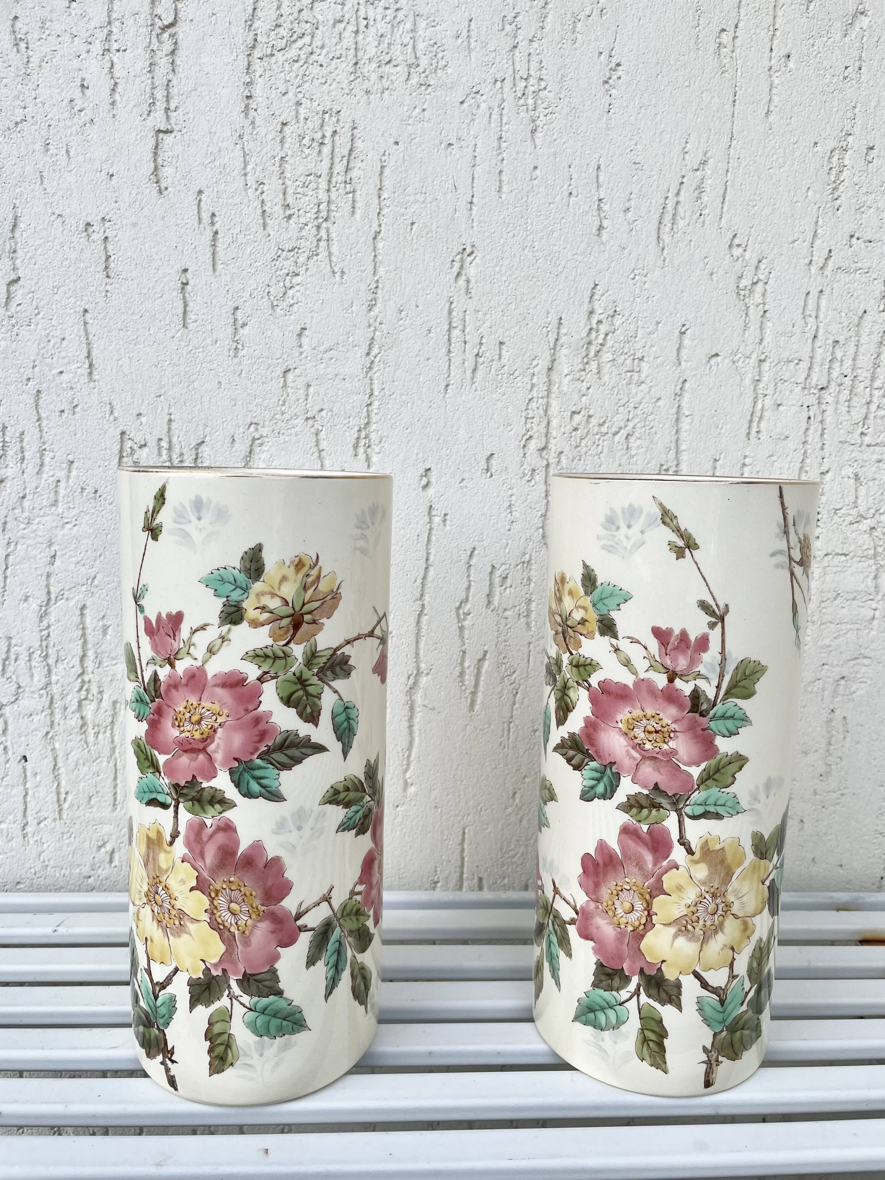 Roller vases in earthenware with floral decoration of wild rose, circa 1930–1950.