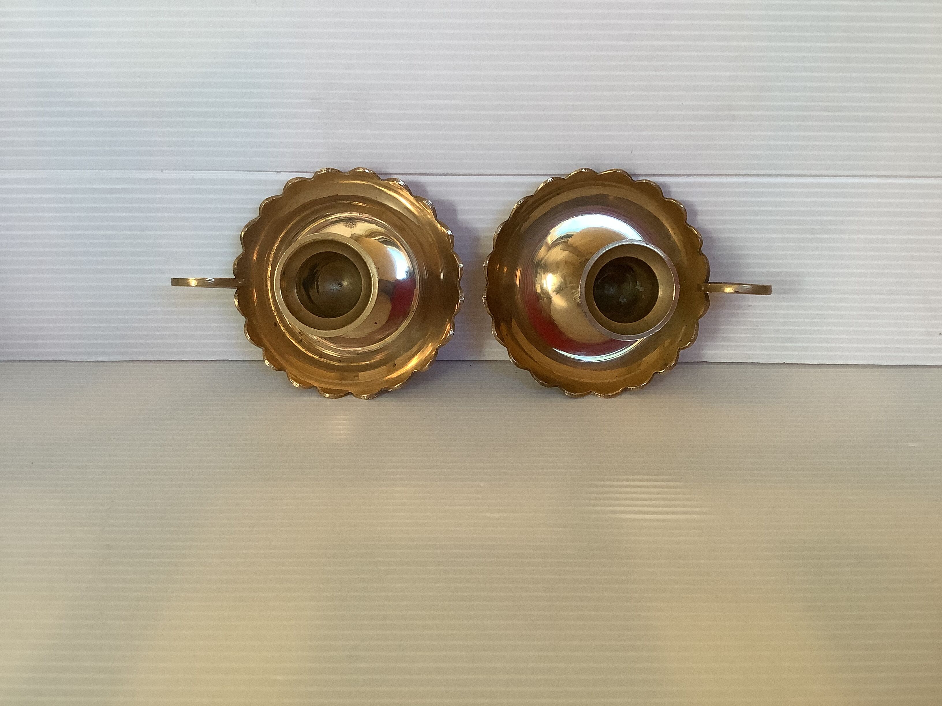 Pair of brass cellar rat candle holders