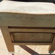 Butcher's log cabinet with two drawers and location for kitchen utensils