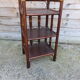 Meuble étagère en rotin vintage