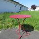 Antique wrought iron gueridon repainted in burgundy red.