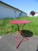 Antique wrought iron gueridon repainted in burgundy red.