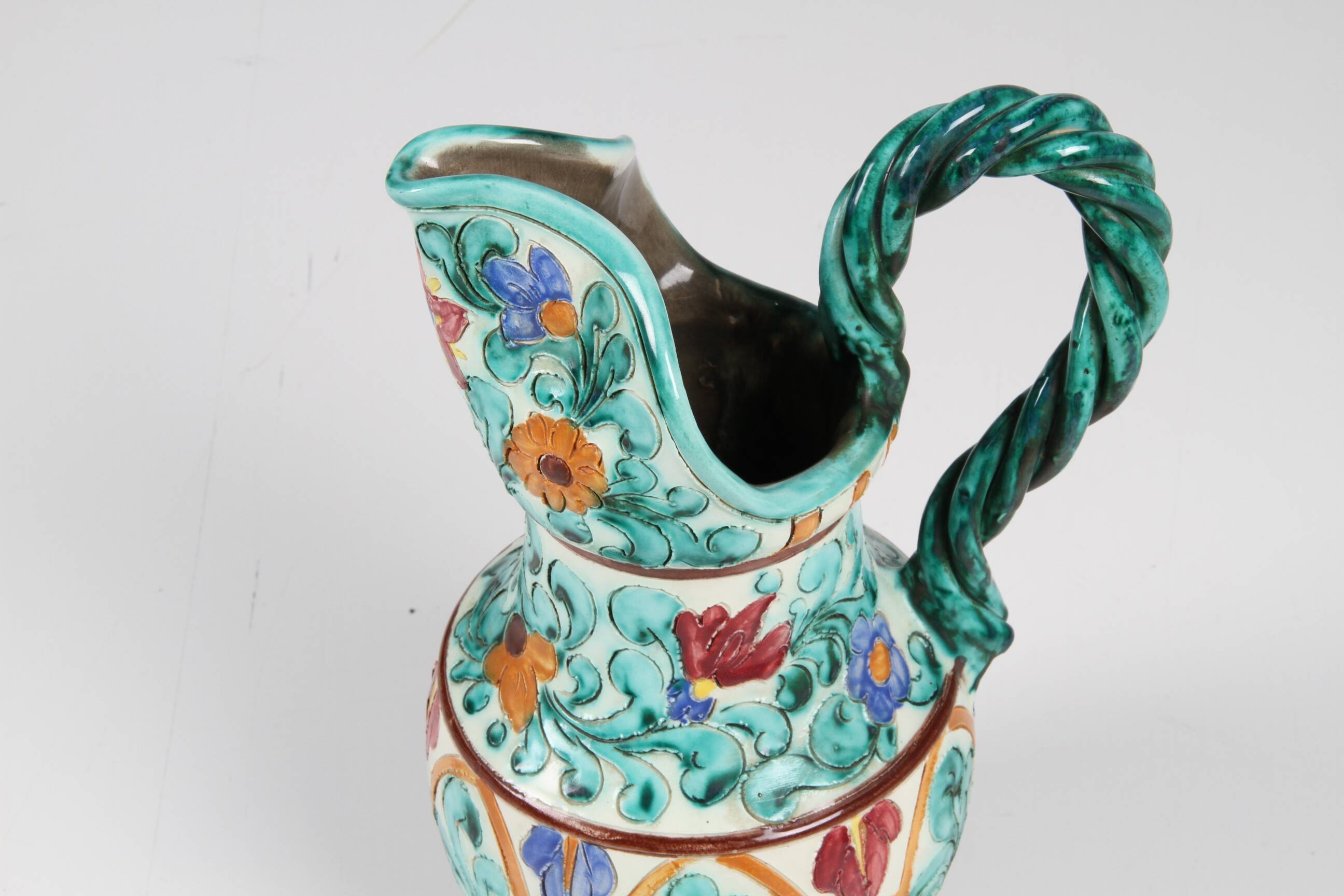 Polychrome earthenware jug