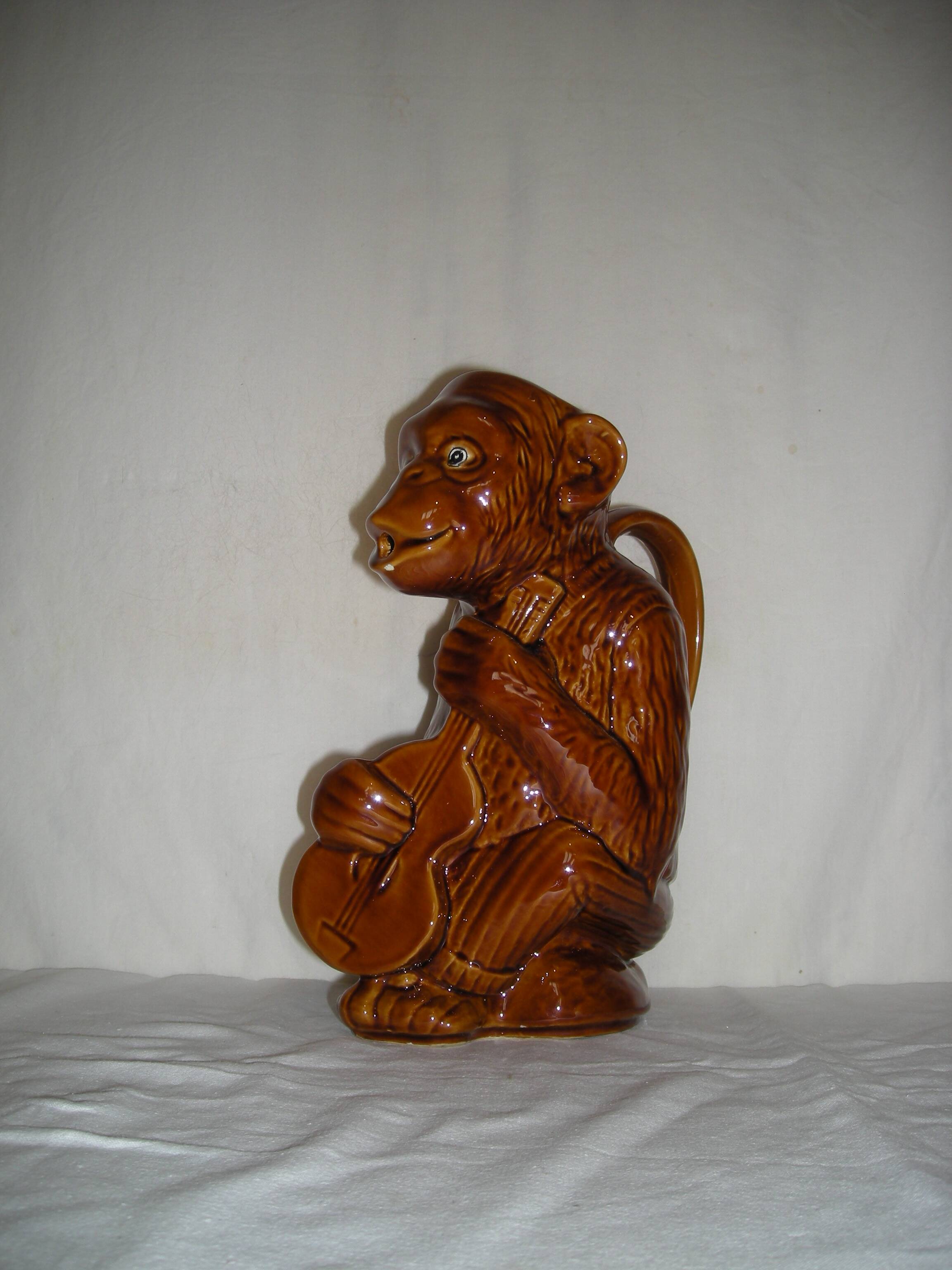 Chimpanzee pitcher; Monkey guitarist musician of the 60s