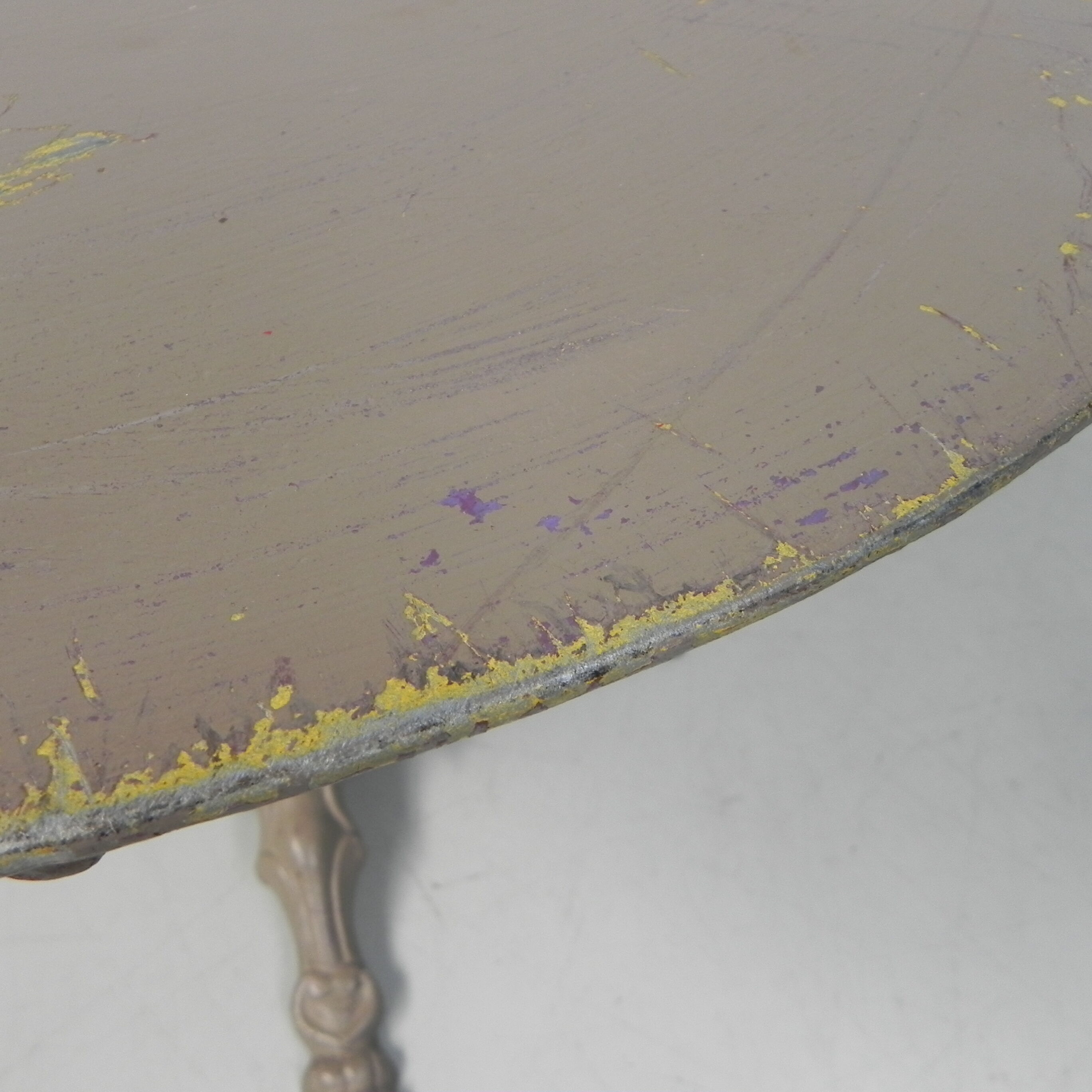 Steel garden table on cast iron base