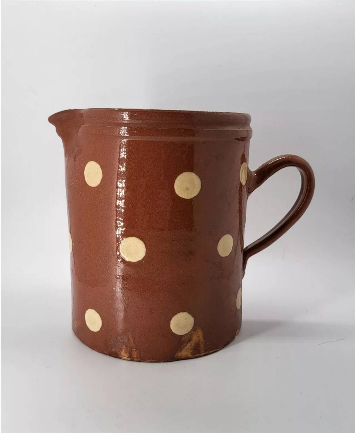 Old pitcher with polka dots savoyard pottery in glazed terracotta alsace