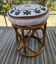 Rattan pouffe with cushion