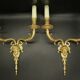 Large pair of wall sconces with male faces in Louis XV style - gilded bronze