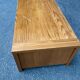 Solid wood coffee table with sliding door, stained pine, 120x60cm.