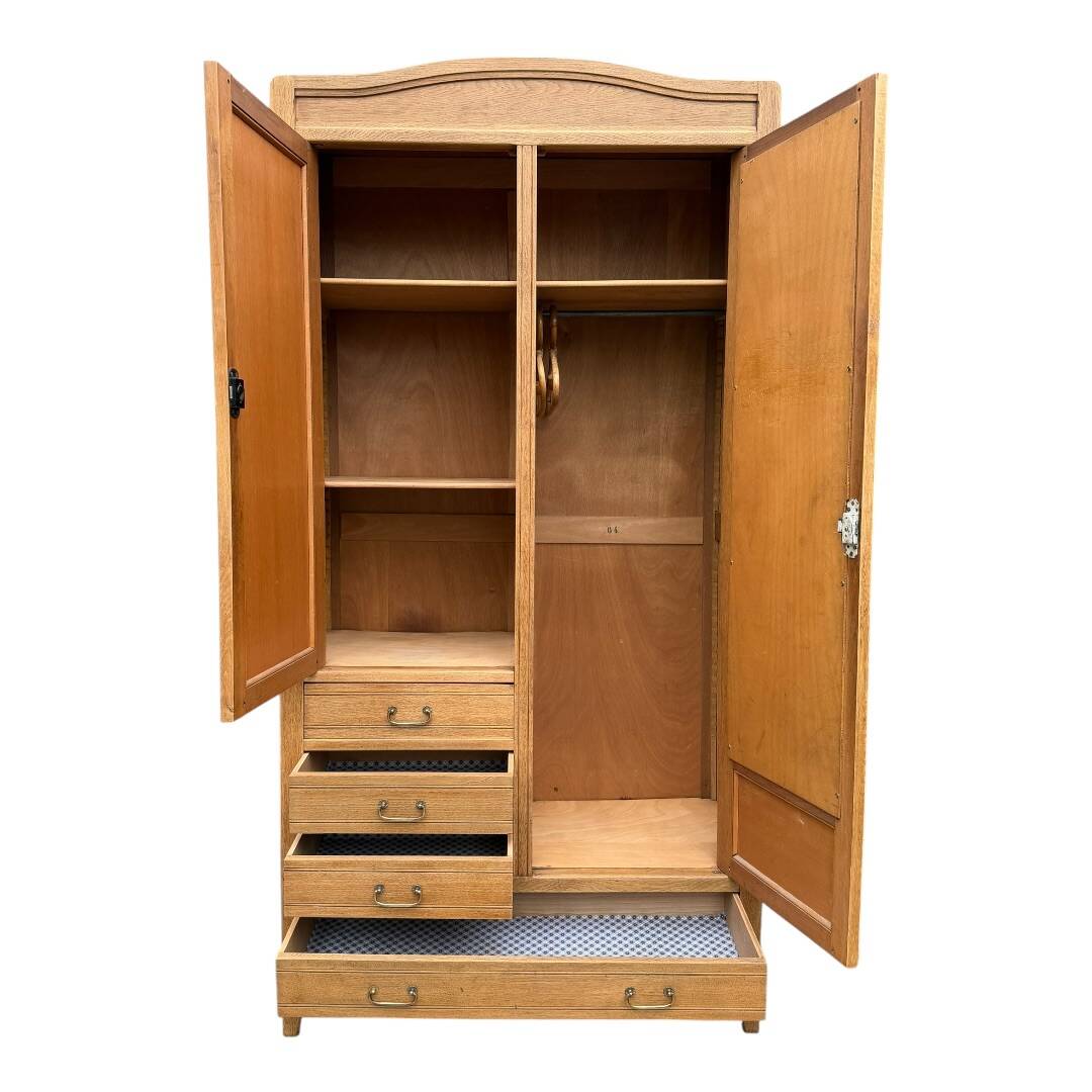Parisian hotel wardrobe with bevelled mirror, solid raw oak, 1920.