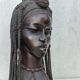Large wooden bust of an African woman.