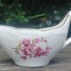 Saucière en porcelaine de la faïencerie de Gien modèle "fleurs de pêcher"