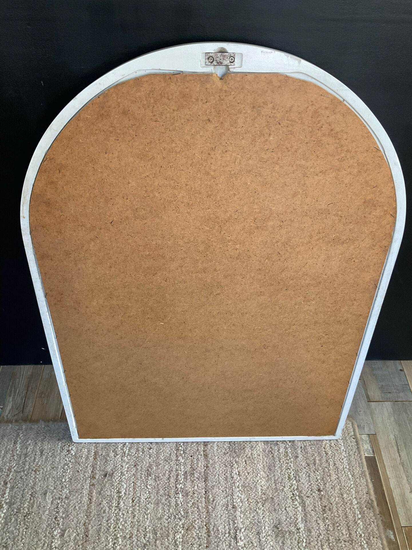 Vintage Art Deco style mirror in stained white wood.