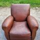 Paire de fauteuils club en cuir brun des années 30