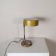 Chrome and ruby brass table lamp in the style of Oscar Torlasco, 1960s.