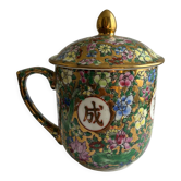 Porcelain covered cup