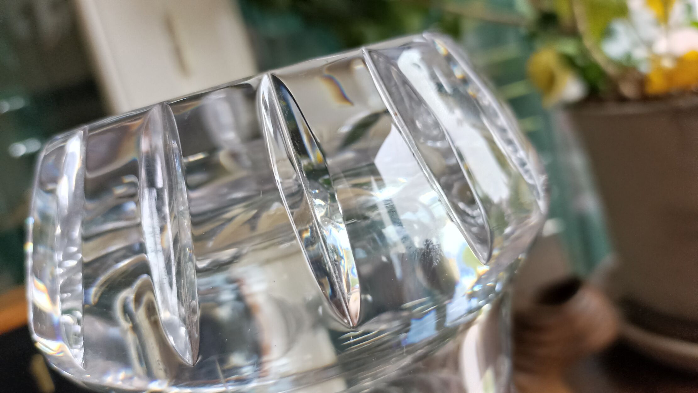 Carved solid crystal vase, floral decoration