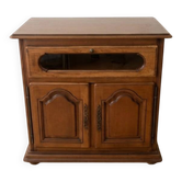 Rustic wooden TV unit with a swivel top and moulded doors.