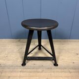 Unmarked black Rowac stool with a dark wood seat.