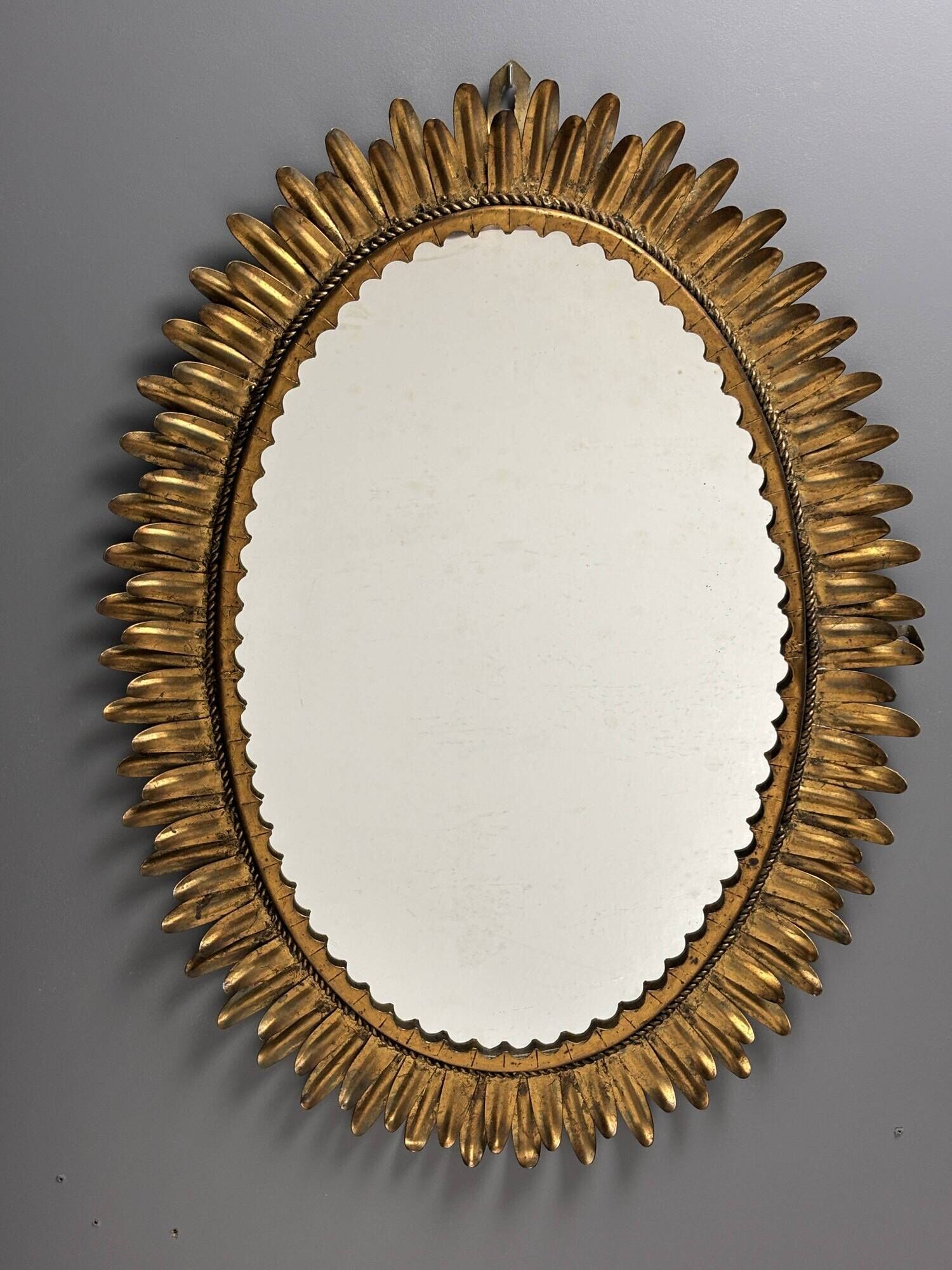 Midcentury bohemian Hollywood Regency Spanish gilt metal sun mirror, 1960s
