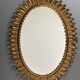 Midcentury bohemian Hollywood Regency Spanish gilt metal sun mirror, 1960s