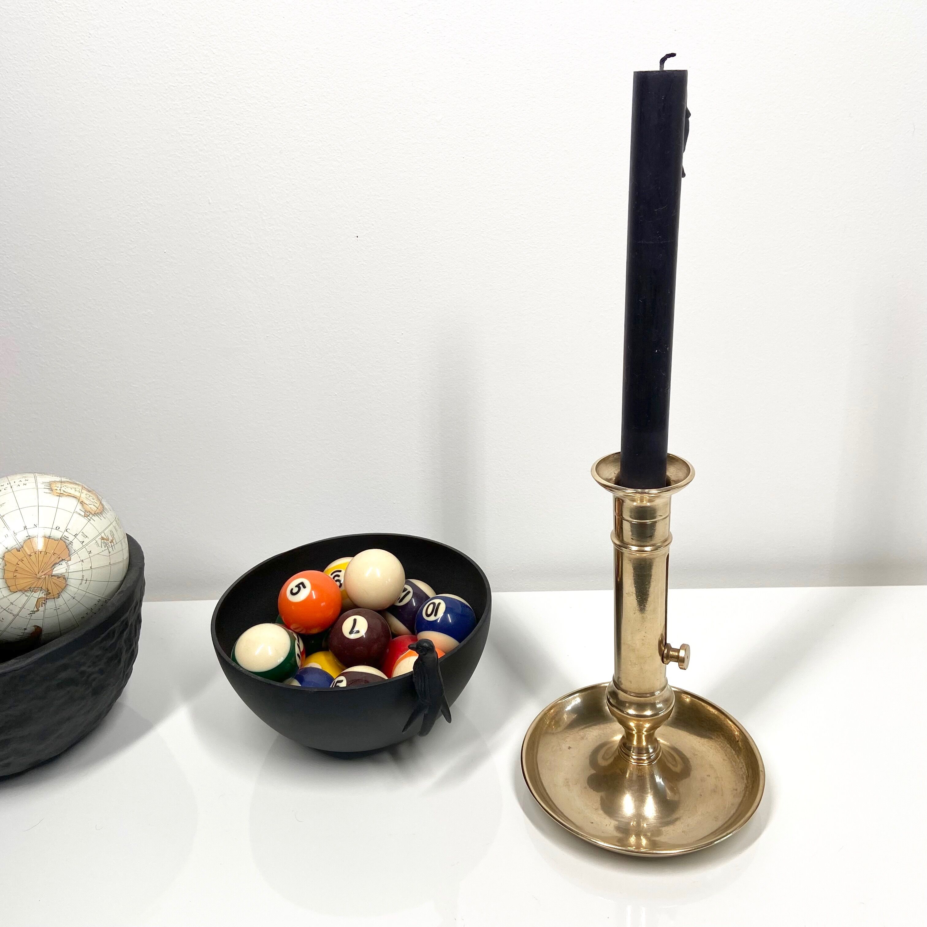 Pusher candle holder and solid brass