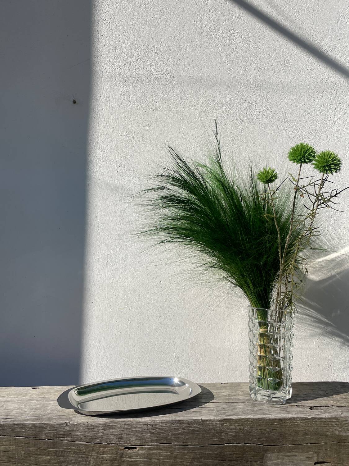 Oval stainless steel dish signed Rémi Letang