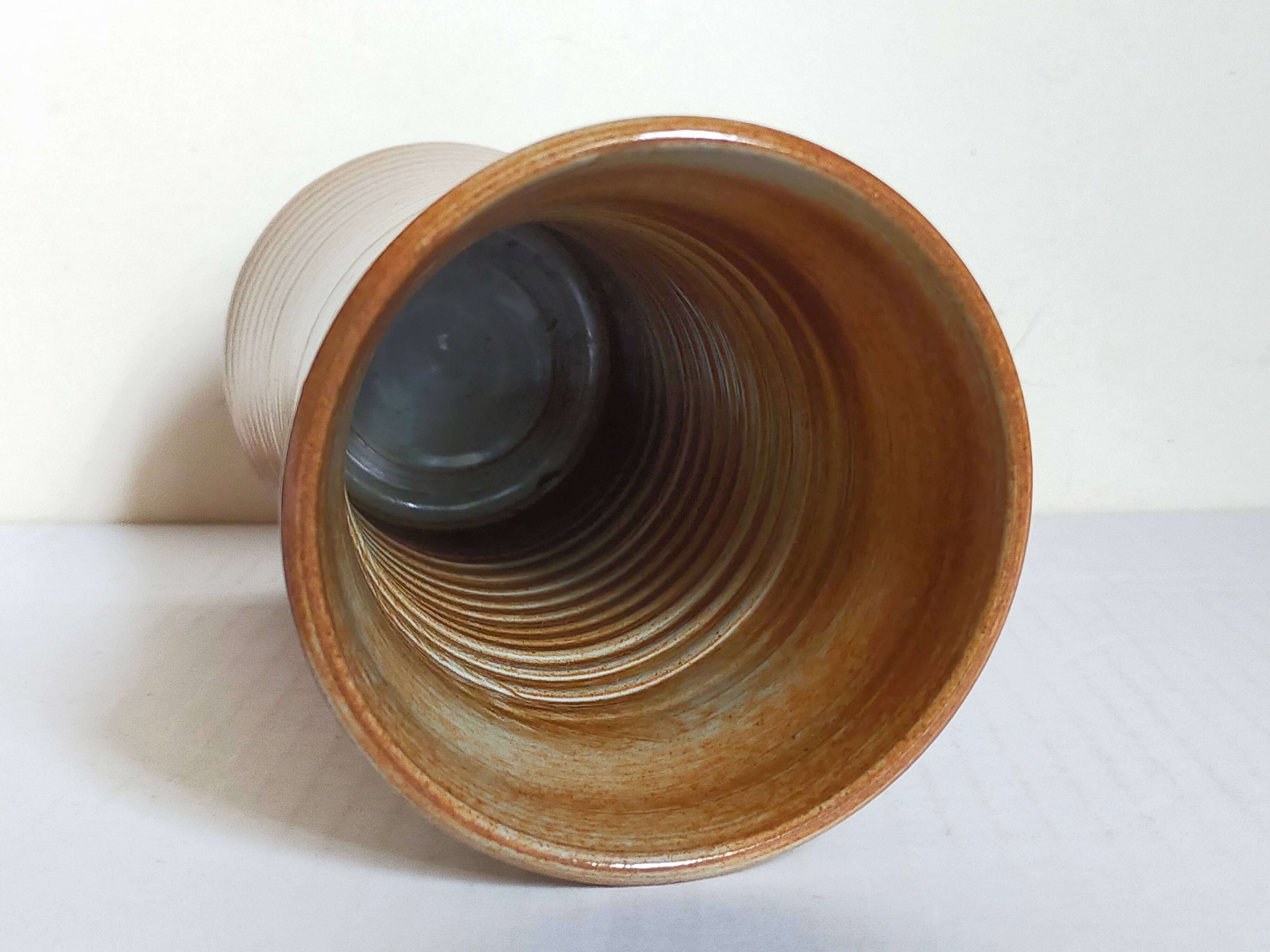 Vintage enameled stoneware potter's diabolo vase
