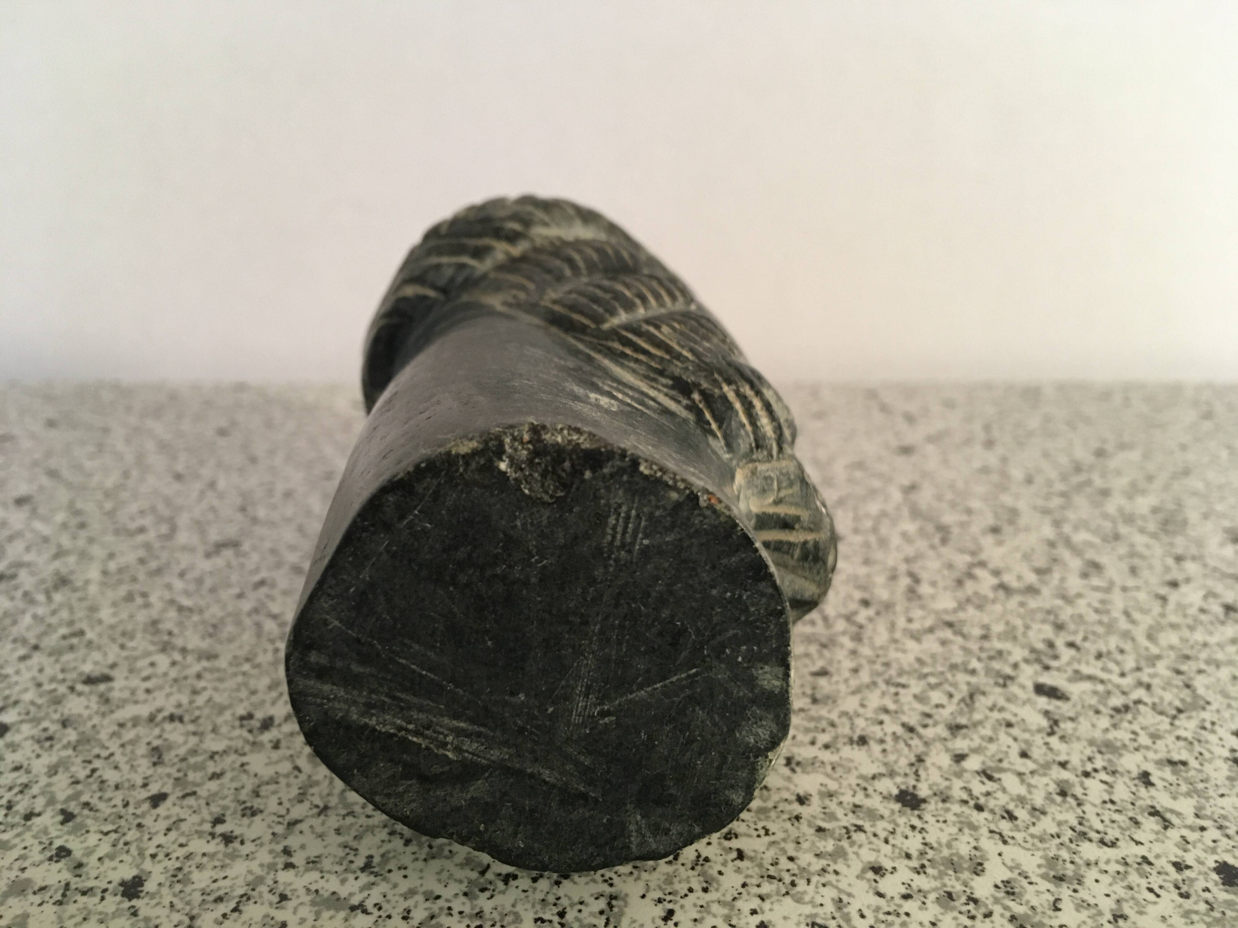 Black marble bust sculpture