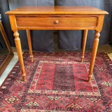 Small solid wood desk with a drawer.
