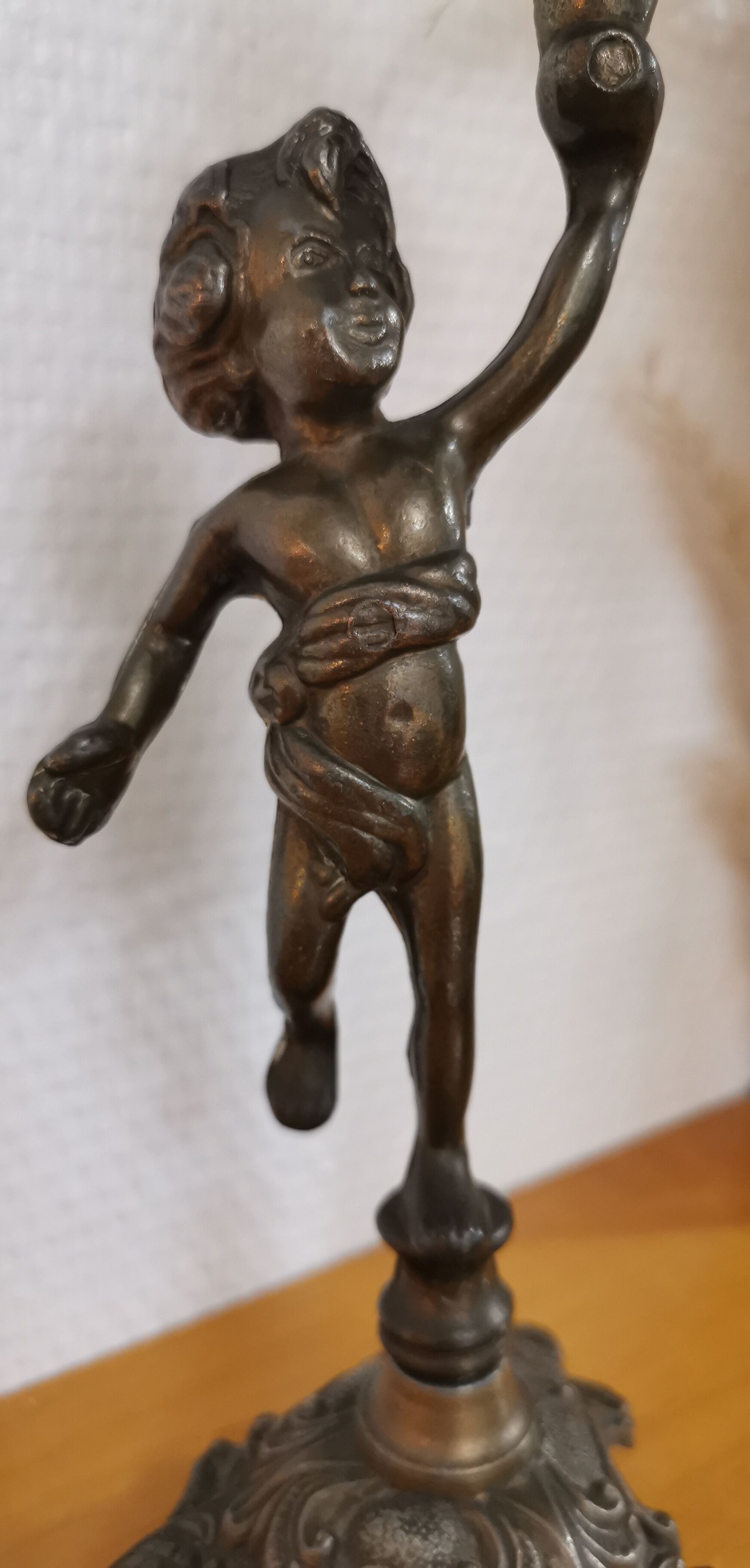 Pair of antique candlesticks in bronze and brass