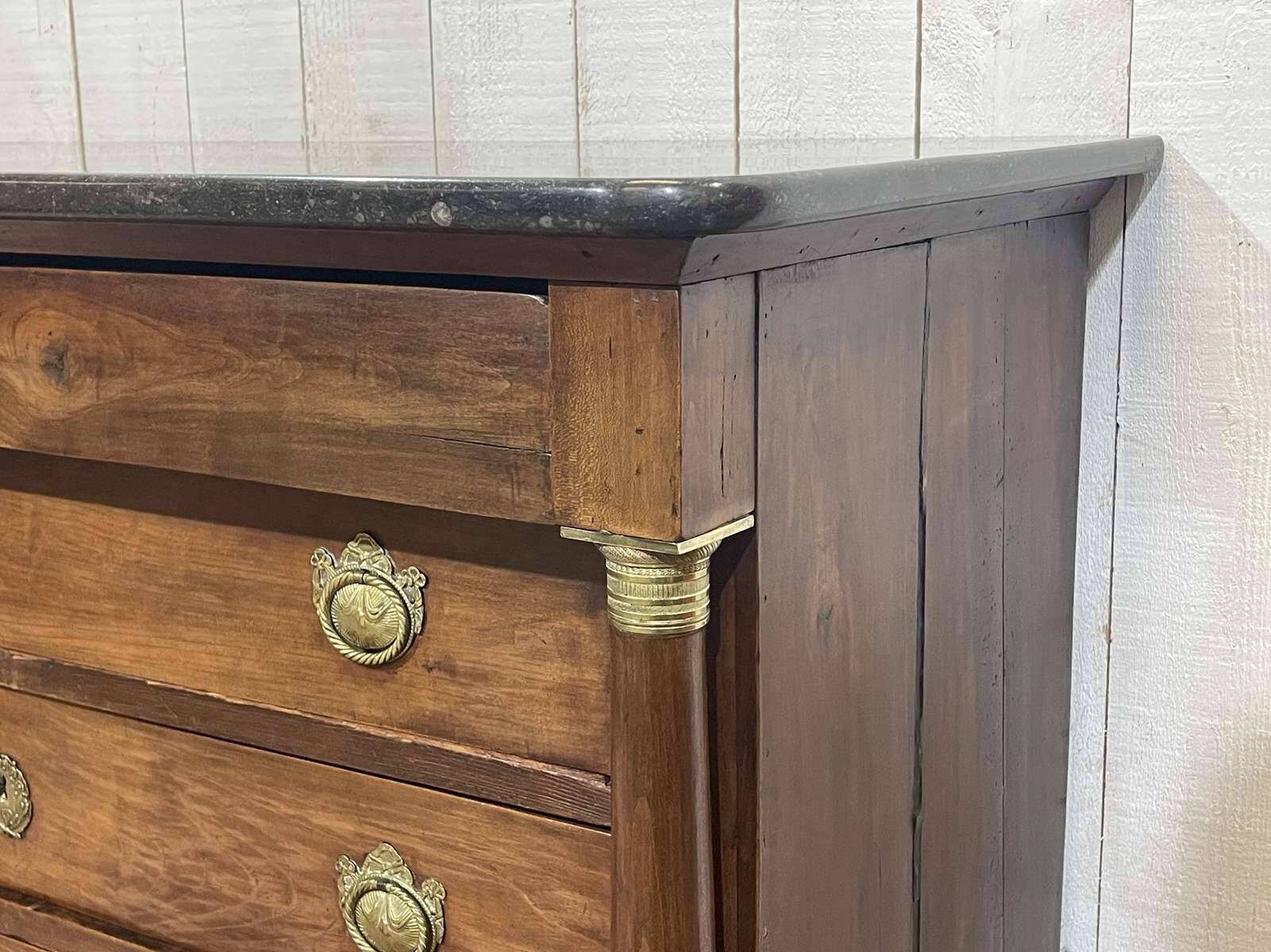 19th century Empire chest of drawers in cherry wood and black marble
