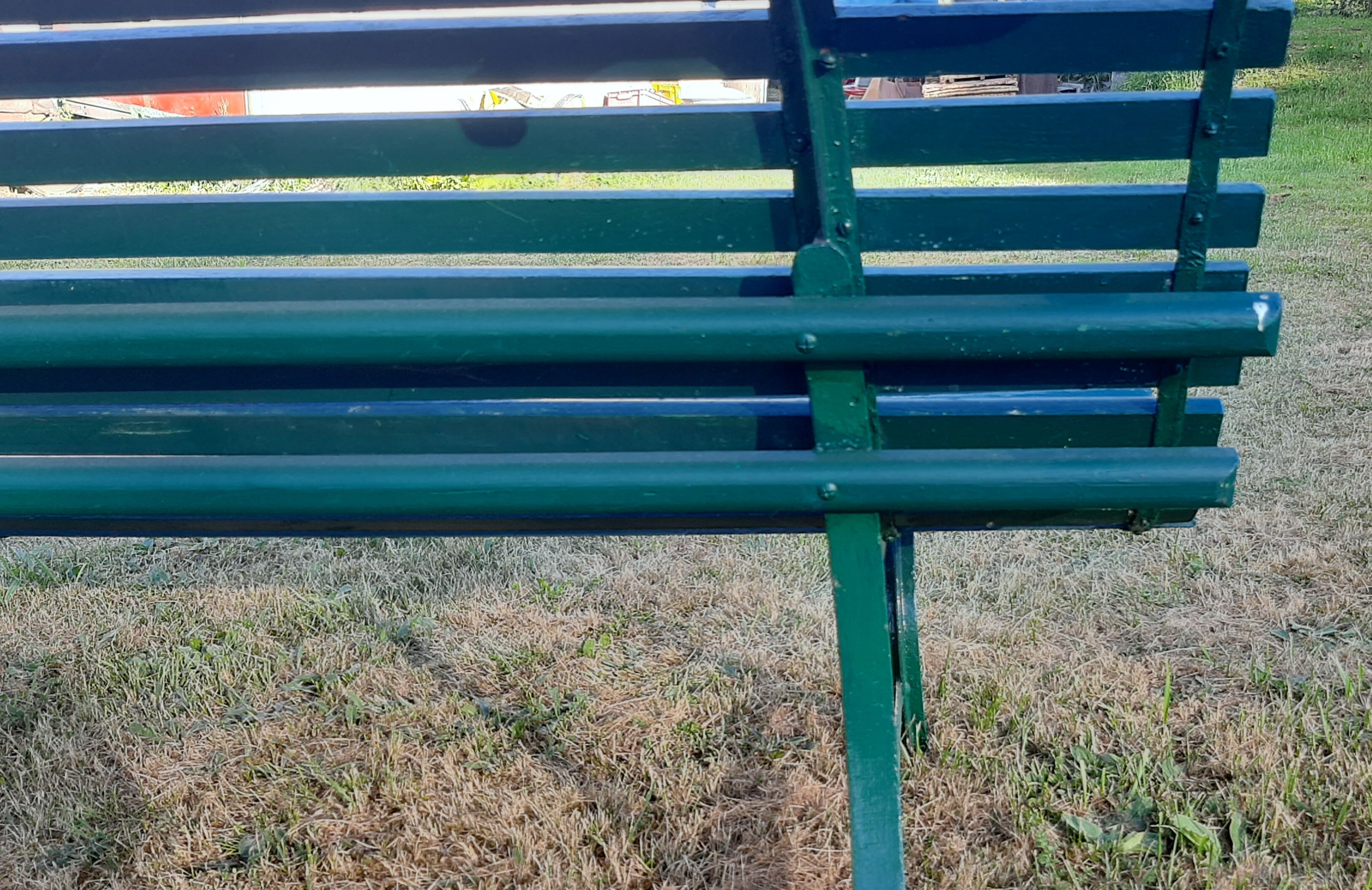 Garden bench with wooden and iron slats