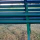 Garden bench with wooden and iron slats