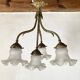 Empire bronze chandelier with 4 lights in glass tulips