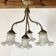 Empire bronze chandelier with 4 lights in glass tulips